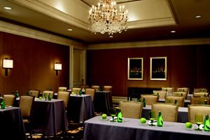 Tablecloths and color-coordinated refreshments add personality to this Tysons Corner meeting space